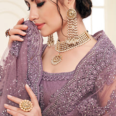 Lavender Heavy Butterfly Net Embroidered Wedding Wear Lehenga