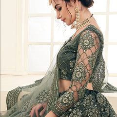 Mehendi Green Heavy Butterfly Net Embroidered Wedding Wear Lehenga