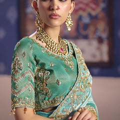 Turquoise Silk Embroidered Wedding Wear Saree