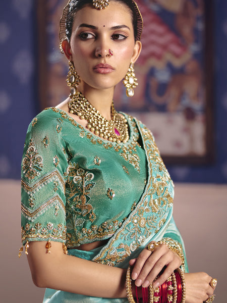 Turquoise Silk Embroidered Wedding Wear Saree