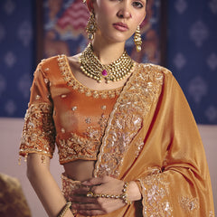 Orange Silk Embroidered Wedding Wear Saree