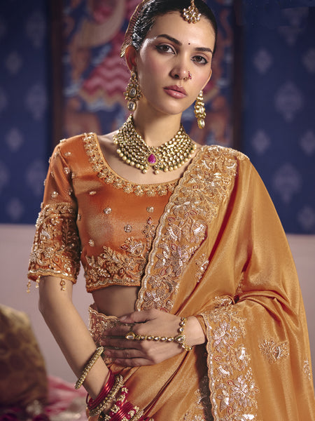 Orange Silk Embroidered Wedding Wear Saree