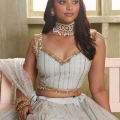 Off White Butterfly Net Thread Sequins Lehenga Choli